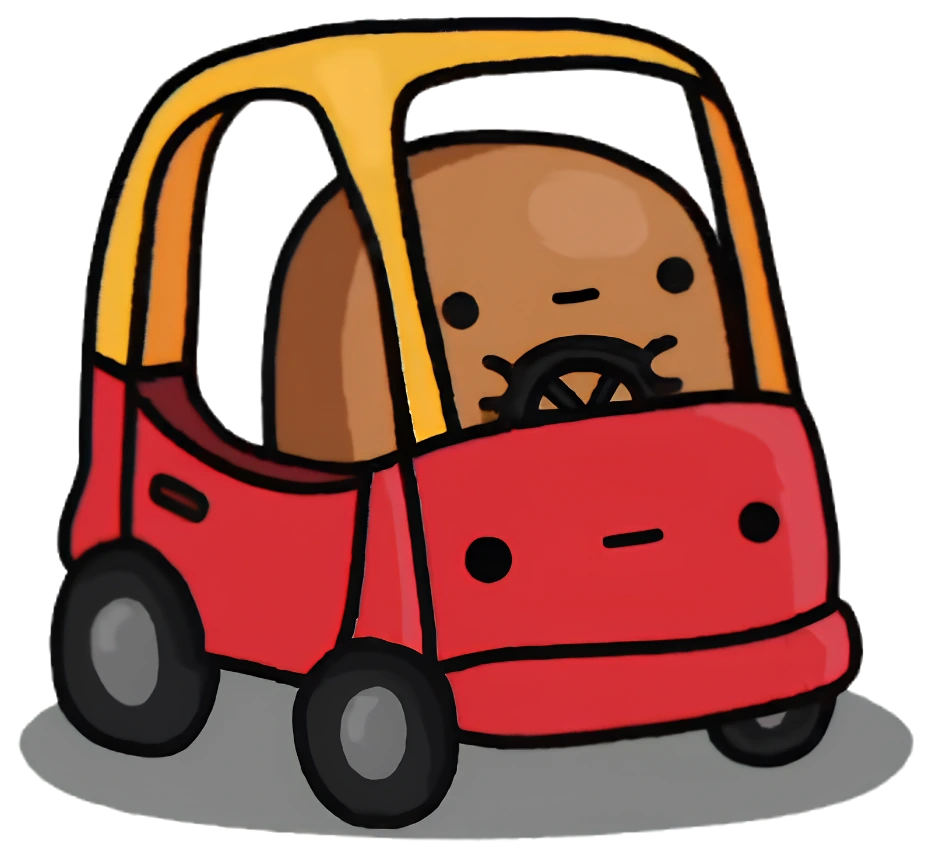 Tato driving a small red toy car